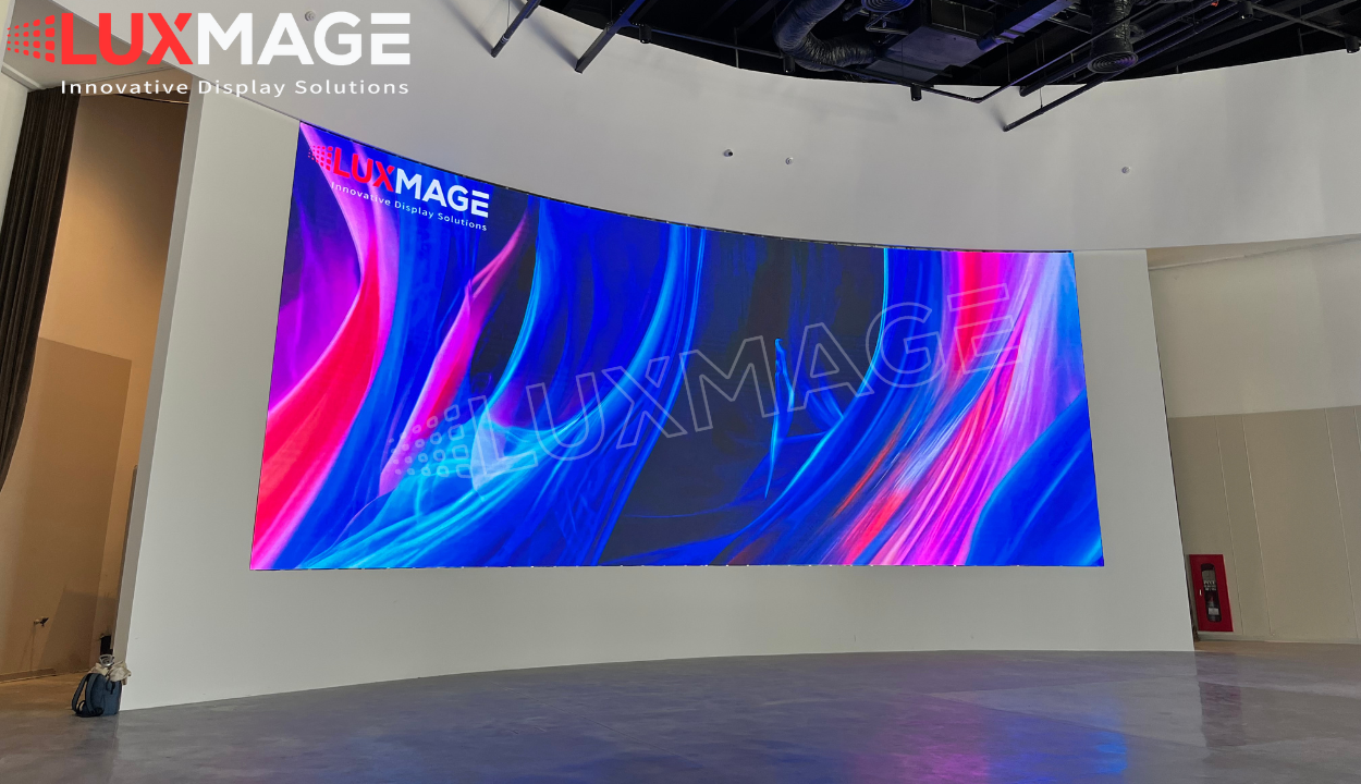 Curved SMD LED screens create a flexible panoramic space for the IMMERSIVE showroom.