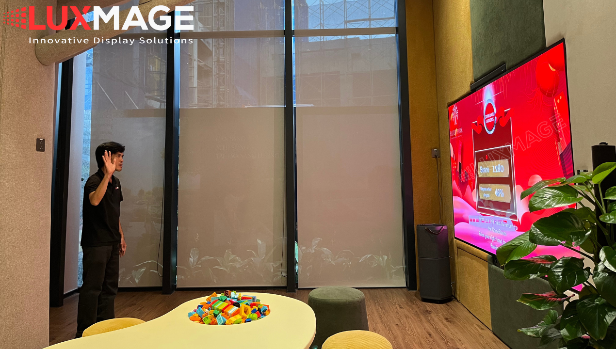Interactive LED screen game at real estate model home